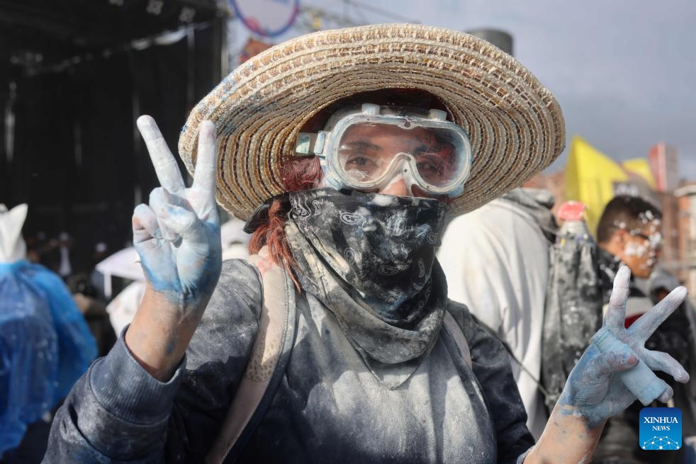 A reveler enjoys her time during the Carnival of Blacks and Whites in Pasto, Colombia on Jan. 3, 2024. The carnival was inscribed on the UNESCO Representative List of the Intangible Cultural Heritage of Humanity in 2009.(Photo: Xinhua)