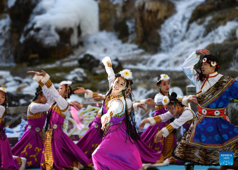 Performers dance at the opening ceremony of an international tourism festival at the Jiuzhaigou National Park in southwest China's Sichuan Province, Jan. 4, 2024. An international tourism festival featuring frozen waterfalls opened Thursday at the Jiuzhaigou National Park, a UNESCO World Heritage Site. The national park, also known as the Jiuzhai Valley, contains around 20 tourist sites and is known for its spectacular waterfalls, lush forest, serene plateau lakes, and karst rock formations.(Photo: Xinhua)