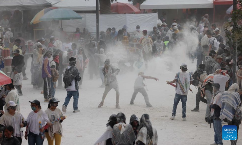 Revelers enjoy their time during the Carnival of Blacks and Whites in Pasto, Colombia on Jan. 3, 2024. The carnival was inscribed on the UNESCO Representative List of the Intangible Cultural Heritage of Humanity in 2009.(Photo: Xinhua)