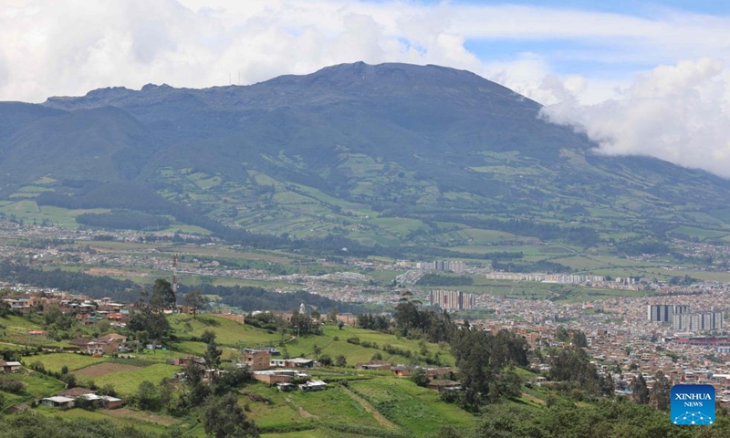 This photo taken on Jan. 5, 2024 shows the Galeras Volcano and the city view of Pasto in the department of Narino, Colombia. (Xinhua/Zhou Shengping)