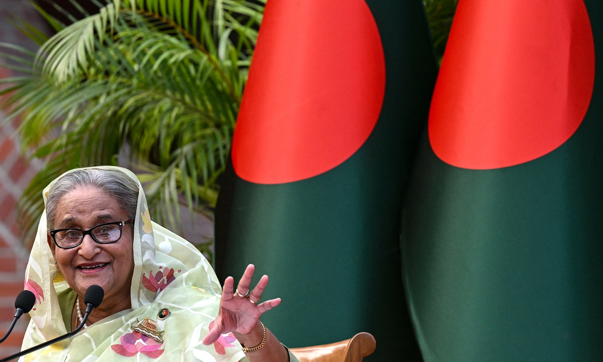 Bangladesh's Prime Minister Sheikh Hasina gestures while speaking to the media, a day after she won the 12th parliamentary elections, in Dhaka on January 8, 2024. Photo: AFP 