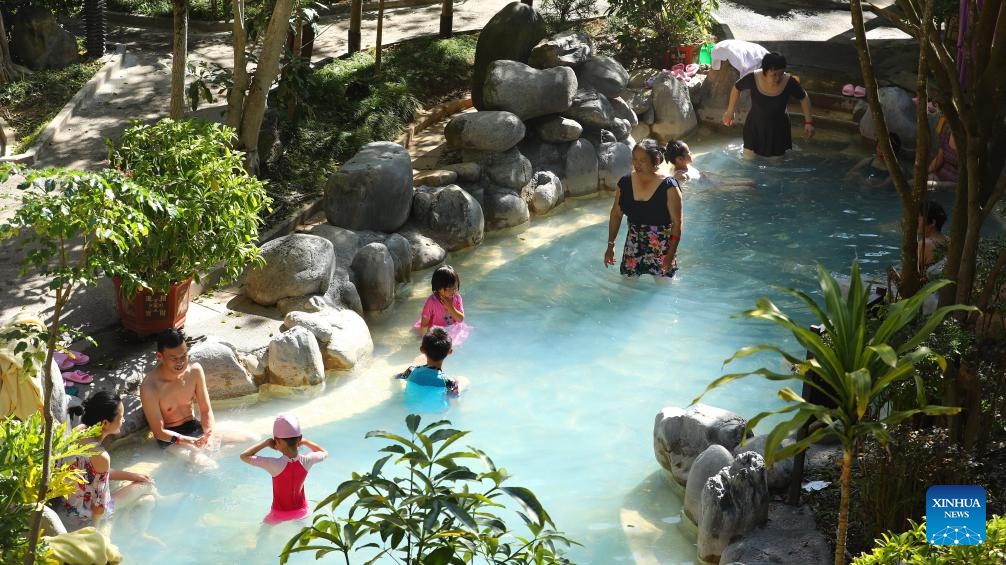 Tourists enjoy themselves at a hot spring pool in Tengchong City, southwest China's Yunnan Province, Jan. 7, 2024. Yunnan has attracted legions of tourists this winter due to its mild climate.(Photo: Xinhua)