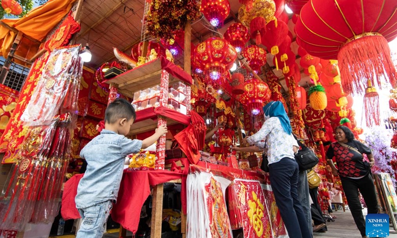 People shop for decorations at Pancoran Glodok in Jakarta, Indonesia, Jan. 9, 2024.(Photo: Xinhua)