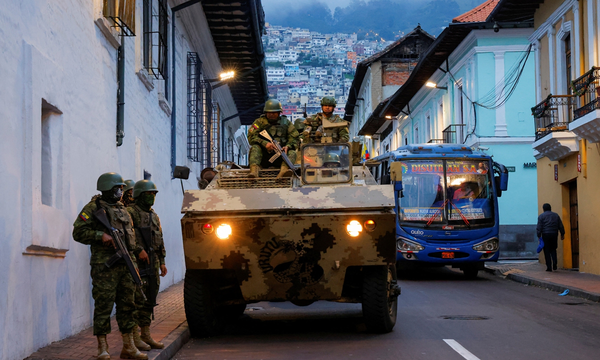 

Soldiers patrol the streets in Cuenca, Ecuador, on January 9, 2024. Ecuadorian President Daniel Noboa on the day declared an internal armed conflict and mobilized the army to combat organized crime linked to drug trafficking, following an escalation in violence in the South American country. On January 8, Ecuador's government declared a 60-day state of emergency with a nighttime curfew to quell violence in cities and inside prisons. Photo: Xinhua