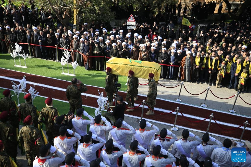 People attend a funeral of a Hezbollah military member killed in an Israeli airstrike, in Kherbet Selem, Lebanon, on Jan. 9, 2024. The confrontations between Hezbollah and Israel have killed 211 on the Lebanese side, including 154 Hezbollah members and 35 civilians, according to Lebanese security sources.(Photo: Xinhua)