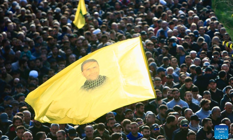 People attend a funeral of a Hezbollah military member killed in an Israeli airstrike, in Kherbet Selem, Lebanon, on Jan. 9, 2024. The confrontations between Hezbollah and Israel have killed 211 on the Lebanese side, including 154 Hezbollah members and 35 civilians, according to Lebanese security sources.(Photo: Xinhua)