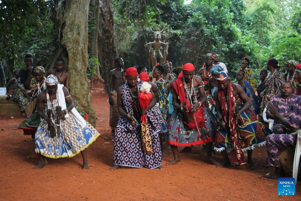 Locals dance during the first edition of Vodun Days in Ouidah, Benin, Jan. 9, 2024. The first edition of Vodun Days was held here on Jan. 9 and Jan. 10 to give greater prominence to the celebration of the traditional culture and boost local tourism.(Photo: Xinhua)