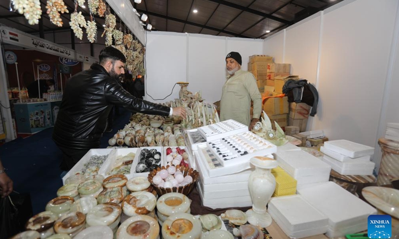 A man visits a booth during the 47th session of the Baghdad International Fair in Baghdad, Iraq, on Jan. 11, 2024. More than 800 Iraqi and foreign companies from about 20 countries participated the event, which opened on Jan. 10 and will last until Jan. 19.(Photo: Xinhua)