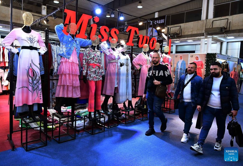 People attend the Syrian fashion expo in Damascus, Syria, on Jan. 11, 2024. The Syrian fashion expo, Motex Khan Al-Hareer, a textile, clothing and production tools fair, kicked off here on Thursday. (Photo: Xinhua)