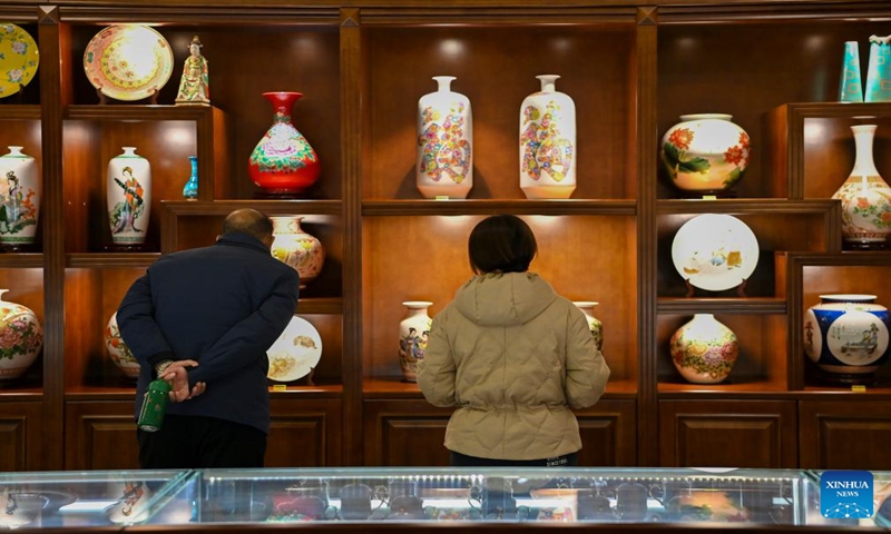 People visit a Honglyucai (Red and Green Color) Porcelain museum in Honglyucai Village, Changzhi City of north China's Shanxi Province, Jan. 4, 2024.(Xinhua/Yang Chenguang)