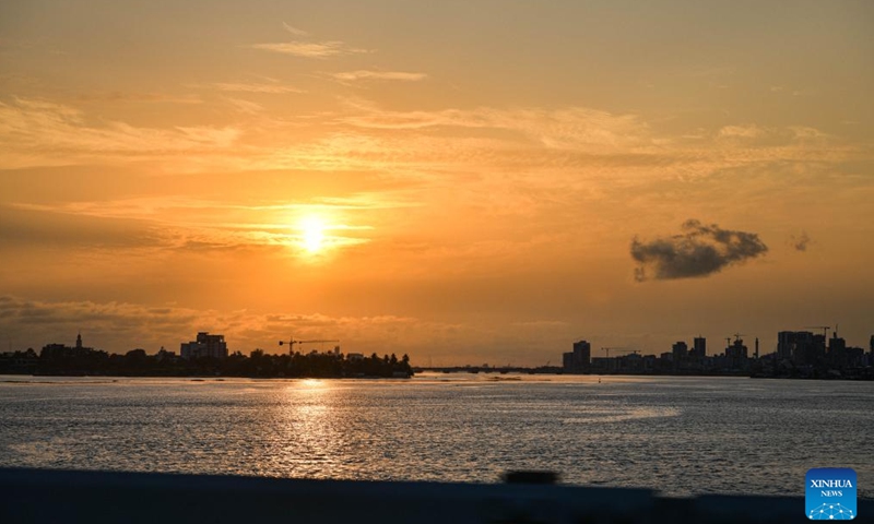 This photo taken on Jan. 10, 2024 shows the sunset scenery in Abidjan, Cote d'Ivoire. Abidjan is the largest city and economic capital of Cote d'Ivoire. (Xinhua/Han Xu)