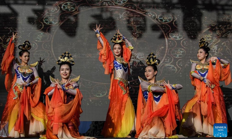 A traditional Chinese dance performance is staged during an event to greet the upcoming Spring Festival in Santiago, Chile, Jan. 13, 2024. (Photo by Jorge Villegas/Xinhua)