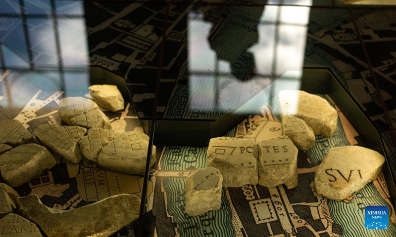 Fragments of the marble map of the ancient Rome are seen the Museum of Forma Urbis in Rome, Italy, Jan. 16, 2024. The Museum of the Forma Urbis, enclosed within a new archaeological park, opened to the public recently. The museum houses the remaining fragments of the Forma Urbis Romae, the giant marble map of ancient Rome engraved between 203 and 211 AD.(Photo: Xinhua)