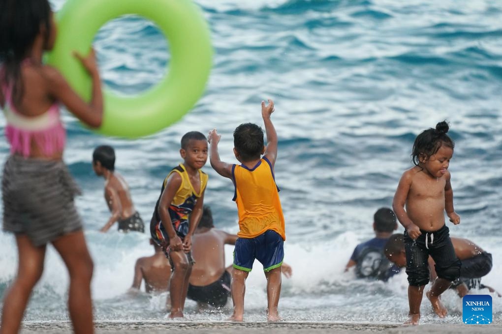 Children play on a beach in the Republic of Nauru, Jan. 17, 2024.(Photo: Xinhua)