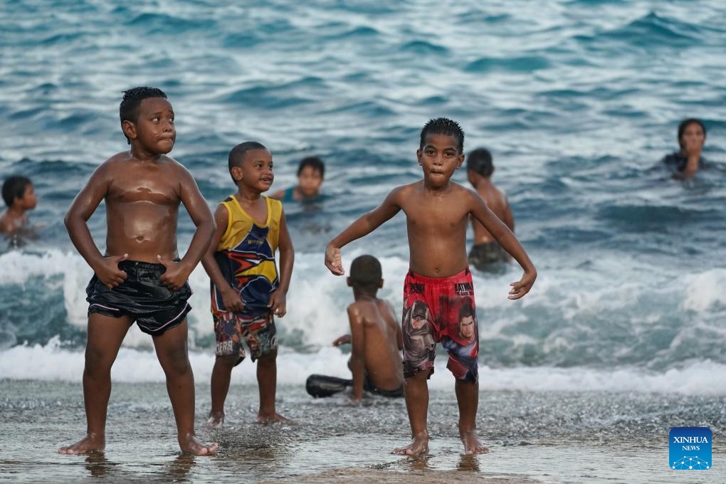 Children play on a beach in the Republic of Nauru, Jan. 17, 2024.(Photo: Xinhua)