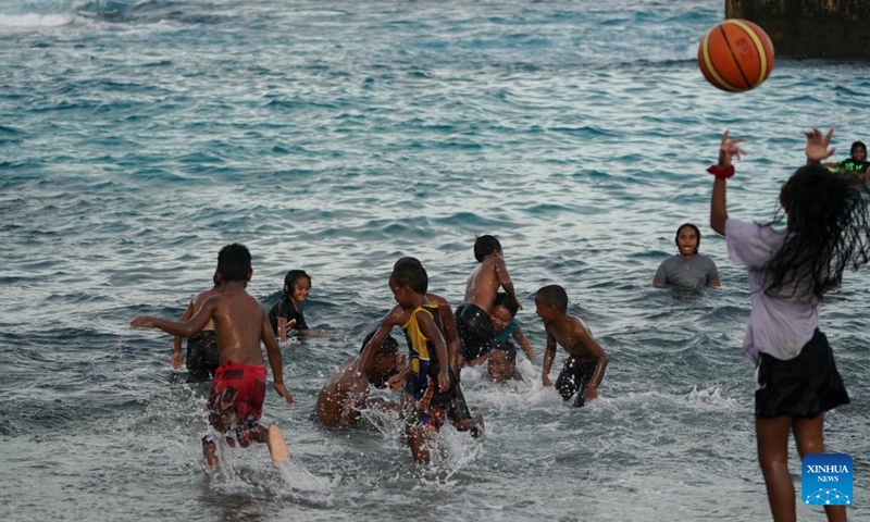 Children play on a beach in the Republic of Nauru, Jan. 17, 2024.(Photo: Xinhua)