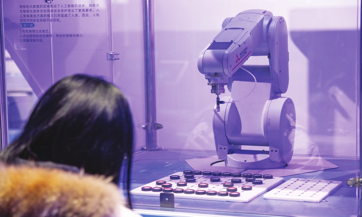 A chess-playing robot makes its debut at the Cyber-security Science and Technology Museum of China on January 17, 2024 in Zhengzhou, Central China's Henan Province, attracting onlookers to come and play with AI robot. Photo: IC