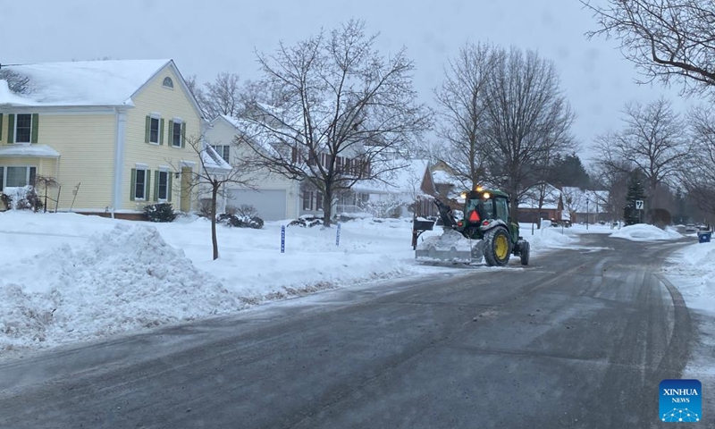 A snowplow removes snow in East Amherst, Erie county, New York State, the United States, on Jan. 18, 2024.(Photo: Xinhua)