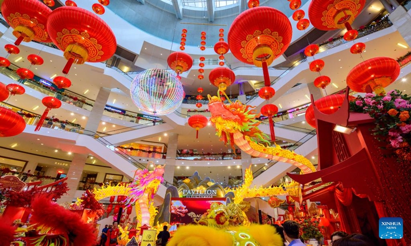 This photo taken on Jan. 16, 2024 shows dragon-shaped light installations in celebration of the upcoming Chinese zodiac Year of the Dragon at a shopping mall in Kuala Lumpur, Malaysia. (Photo by Chong Voon Chung/Xinhua)
