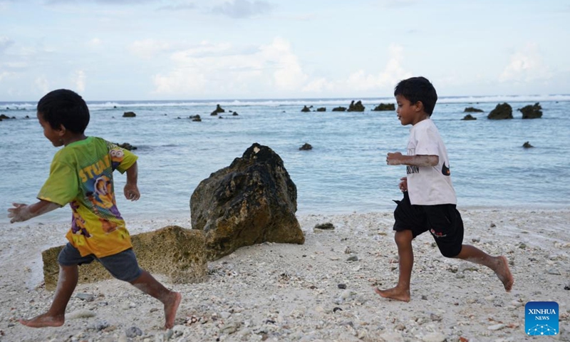 Children play on a beach in the Republic of Nauru, Jan. 20, 2024. (Xinhua/Wang Shen)