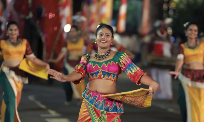 People perform traditional dances during the annual Navam Perahera festival in Colombo, Sri Lanka, on Feb. 23, 2024. (Photo by Ajith Perera/Xinhua)