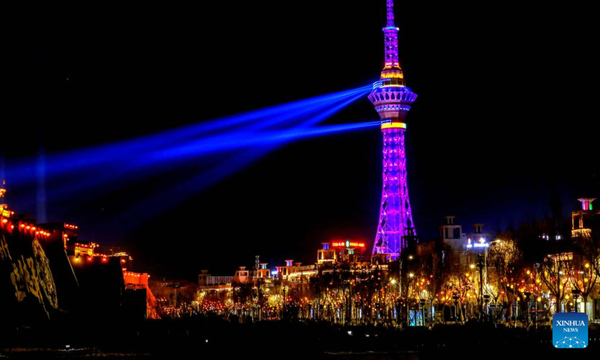 This photo shows a night view of the ancient city of Kashgar, northwest China's Xinjiang Uygur Autonomous Region, Feb 4, 2024. With red lanterns decorated on streets, people can feel the festive atmosphere of the Spring Festival, or the Chinese Lunar New Year, in the ancient city of Kashgar.