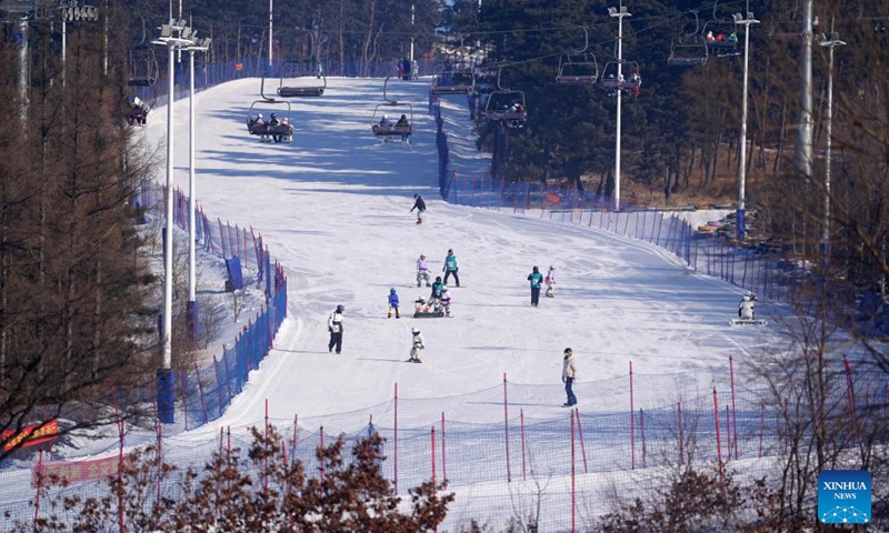 Ski enthusiasts are seen at Tianding Mountain Ski Resort in Changchun, northeast China's Jilin Province, on Jan. 25, 2024. Boasting abundant ice and snow resources, Jilin Province in northeast China continues to optimize its tourism service to gain prominence as one of the most popular winter destinations for tourists. (Xinhua/Chen Yehua)