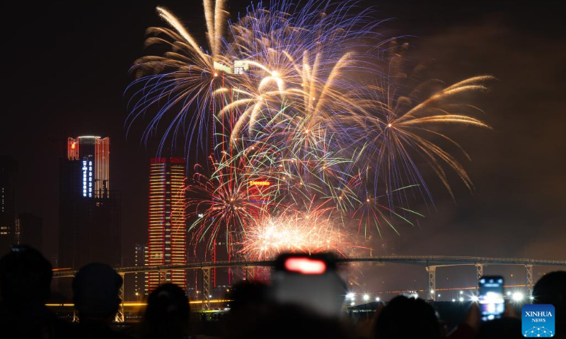 Fireworks in celebration of the Spring Festival illuminate the sky in Macao, south China, Feb. 12, 2024. (Photo: Xinhua)