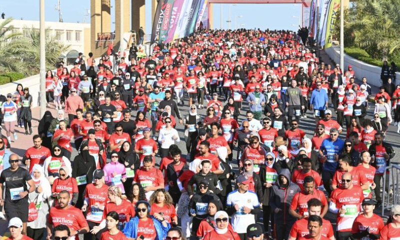 Runners participate in the Kuwait Marathon in Kuwait City, Kuwait, March 2, 2024. (Photo by Asad/Xinhua)