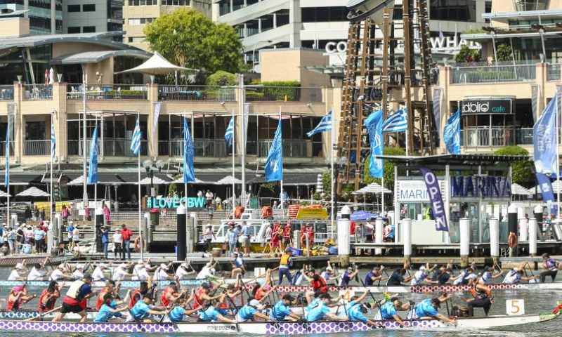 Participants take part in the dragon boat races at Darling Harbour in Sydney, Australia, Feb. 16, 2024. As part of the celebrations to mark the Chinese Lunar New Year, the dragon boat races kicked off here on Friday and will last till Feb. 18. (Xinhua/Ma Ping)