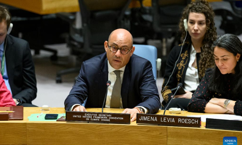 Simon Stiell (C), Executive Secretary of the United Nations Framework Convention on Climate Change (UNFCCC), speaks at the UN Security Council high-level open debate on the impact of climate change and food insecurity on the maintenance of international peace and security at the UN headquarters in New York, on Feb. 13, 2024. Stiell on Tuesday emphasized the critical need for rapid action against climate change to prevent future conflicts. (Loey Felipe/UN Photo/Handout via Xinhua)