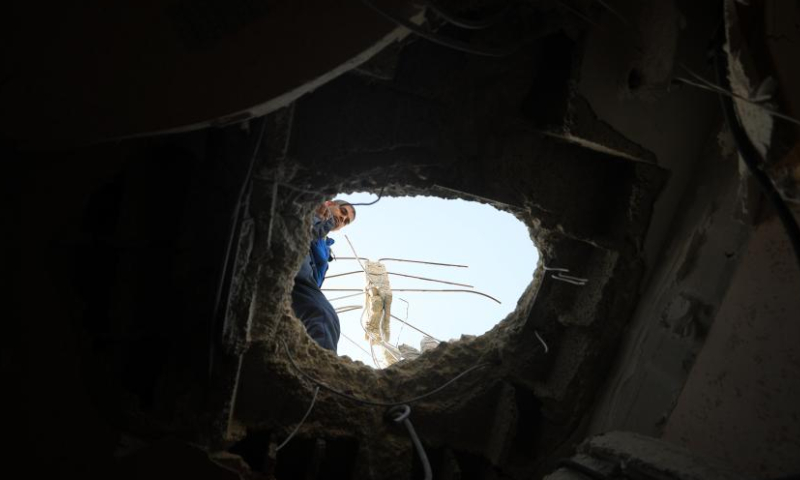 A Palestinian checks a damaged building after an Israeli airstrike in the southern Gaza Strip city of Rafah, on March 2, 2024.

The Palestinian death toll in the Gaza Strip has risen to 30,320, the Hamas-run Health Ministry said in a press statement on Saturday. (Photo by Yasser Qudih/Xinhua)