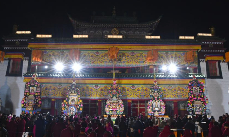 Butter sculptures made by Buddhists are displayed at Labrang Monastery in Xiahe County, northwest China's Gansu Province, Feb. 24, 2024. An annual butter sculpture show was held at Labrang Monastery, one of six prestigious temples of the Gelug Sect of Tibetan Buddhism, on Saturday, the Chinese Lantern Festival, to pray for good fortune and harvest. (Xinhua/Chen Bin)