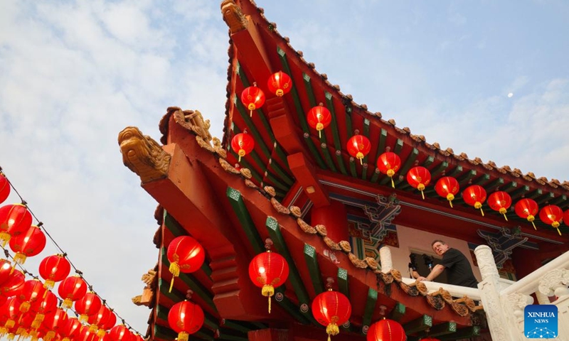 A tourist visits the Thean Hou Temple in Kuala Lumpur, Malaysia, Jan. 21, 2024. The Thean Hou Temple has been preparing for the Spring Festival, due on Feb. 10, 2024. (Xinhua/Cheng Yiheng)