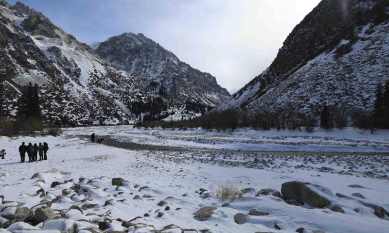 This photo taken on Feb. 23, 2024 shows a winter scenery at Ala-Archa National Park, some 30 kilometers away from Bishkek, capital of Kyrgyzstan. (Photo by Roman/Xinhua)