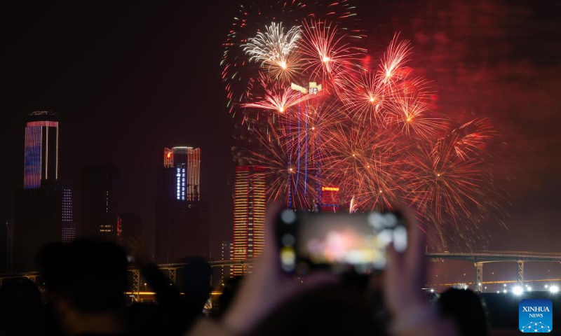 Fireworks in celebration of the Spring Festival illuminate the sky in Macao, south China, Feb. 12, 2024. (Photo: Xinhua)