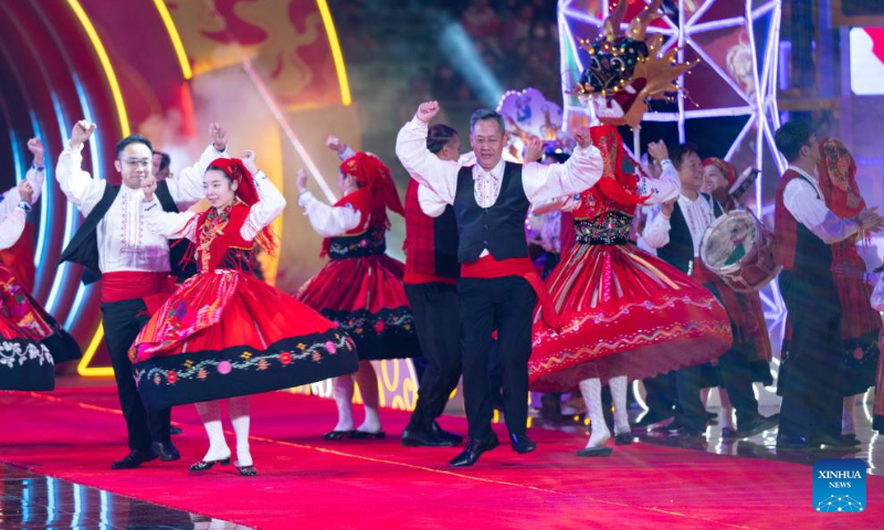 Actors perform during Celebrations of the 25th Anniversary of the Establishment of the Macao Special Administrative Region and the Parade for Celebration of the Year of the Dragon in south China's Macao on Feb. 12, 2024. (Xinhua/Cheong Kam Ka)