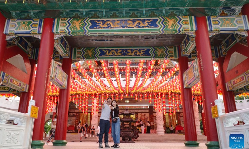 Tourists visit the Thean Hou Temple in Kuala Lumpur, Malaysia, Jan. 21, 2024. The Thean Hou Temple has been preparing for the Spring Festival, due on Feb. 10, 2024. (Xinhua/Cheng Yiheng)