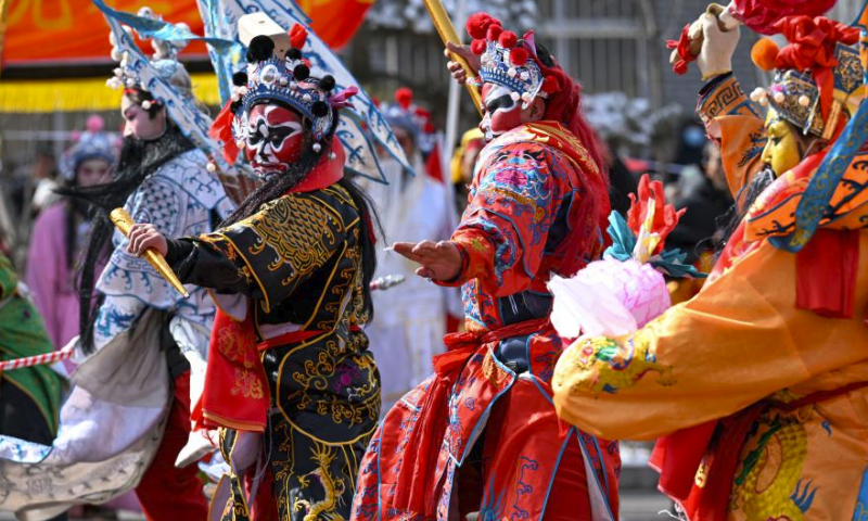 Folk artists perform during a national Shehuo competition in Guyuan, northwest China's Ningxia Hui Autonomous Region, Feb. 24, 2024. Nearly 2,000 people of 14 Shehuo teams took part in the competition in Guyuan to celebrate the Lantern Festival.

Shehuo, a traditional carnival-like folk celebration, is usually held on the 15th day of the lunar year, or the Lantern Festival, in some areas of north China.

Shehuo festivities feature performances like dragon dance, lion dance, traditional Chinese opera, drum playing and other folk performances that may vary in different regions. (Xinhua/Feng Kaihua)