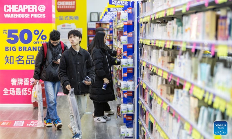 Customers shop at Chemist Warehouse in Yuzhong District of southwest China's Chongqing Municipality, Jan. 21, 2024. (Xinhua/Chu Jiayin)