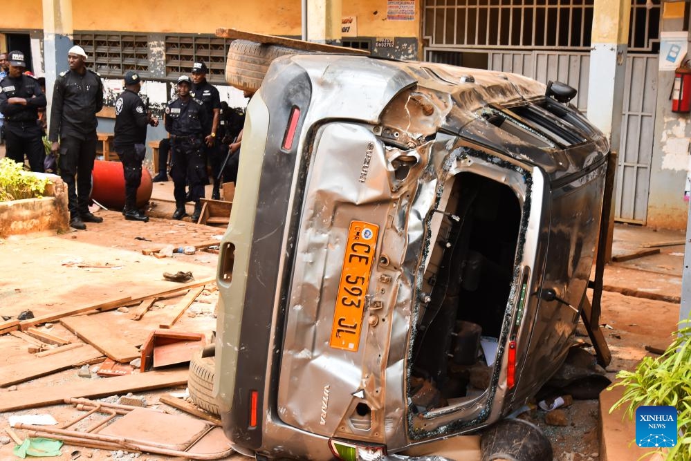 Photo taken on Jan. 22, 2024 shows a vehicle damaged in a stampede at the Etoug-Ebe Bilingual High School in Yaounde, Cameroon. About 106 students were injured on Monday following a stampede at the government-run secondary school in Yaounde, according to Minister of Public Health Manaouda Malachie.(Photo: Xinhua)