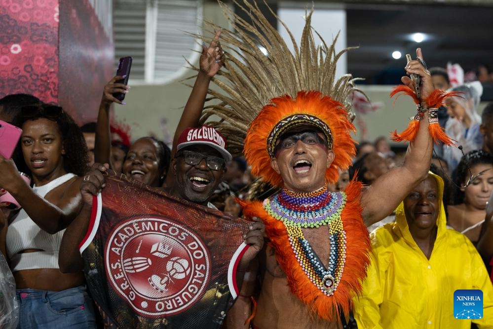 People cheer in support of the samba school they endorse during a carnival parade rehearsal in Rio de Janeiro, Brazil, Jan. 21, 2024.(Photo: Xinhua)