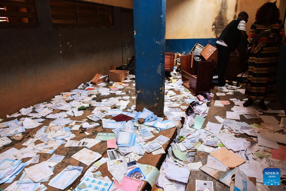 Photo taken on Jan. 22, 2024 shows students' report cards and other documents on the ground after a stampede at the Etoug-Ebe Bilingual High School in Yaounde, Cameroon. About 106 students were injured on Monday following a stampede at the government-run secondary school in Yaounde, according to Minister of Public Health Manaouda Malachie.(Photo: Xinhua)