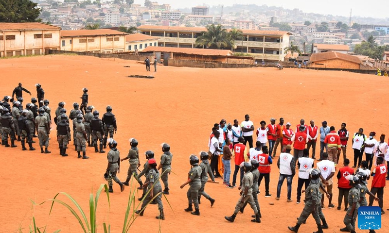 Gendarmes and medical workers are seen at the Etoug-Ebe Bilingual High School in Yaounde, Cameroon, on Jan. 22, 2024. About 106 students were injured on Monday following a stampede at the government-run secondary school in Yaounde, according to Minister of Public Health Manaouda Malachie.(Photo: Xinhua)