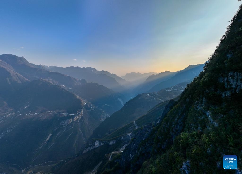 An aerial drone photo taken on Jan. 11, 2024 shows a view of Lanying Grand Canyon in Wuxi County, southwest China's Chongqing. Located in Lanying Grand Canyon in Wuxi County, the Lanying Cliff Road is an awesome path carved out of the mountains. The road, built for over four years by the locals, is the only transportation route connecting Lanying Village to the outside world.(Photo: Xinhua)