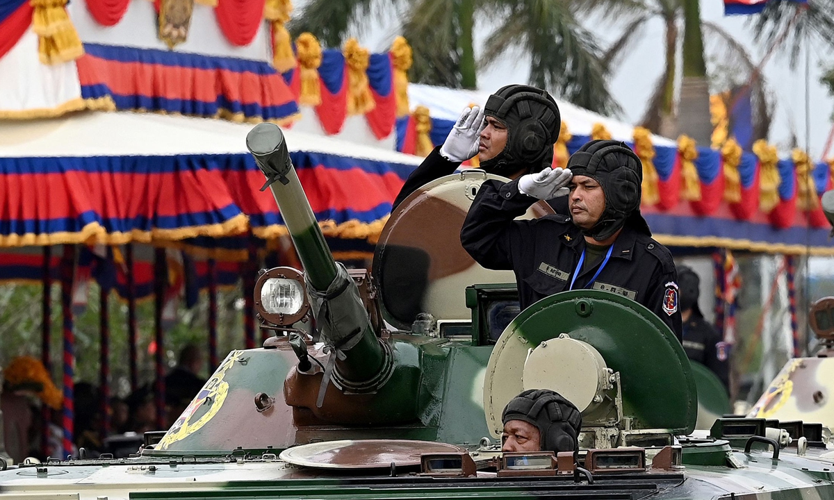 Cambodian soldiers salute during a military parade to mark the 25th anniversary of the formation of the Royal Cambodian Army (RCA) in Phnom Penh on January 24, 2024. Dressed in full military regalia, Cambodian Prime Minister Hun Manet presided over the ceremony. Photo: VCG