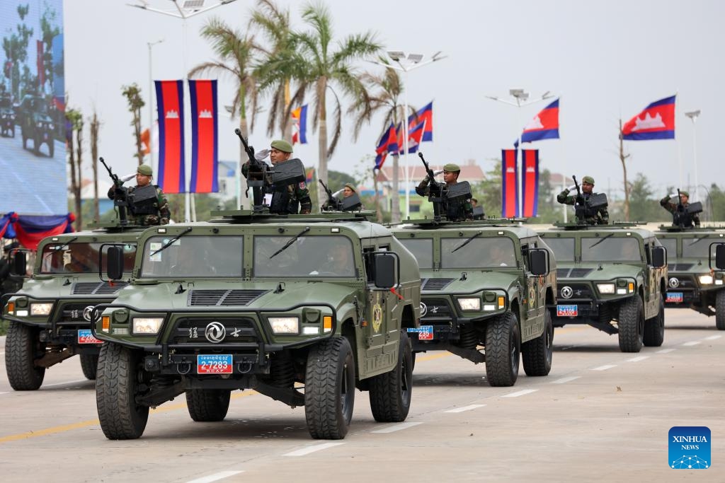 Military vehicles parade in celebration of the 25th anniversary of the founding of the Royal Cambodian Army (RCA) in Phnom Penh, Cambodia, Jan. 24, 2024. Cambodia on Wednesday celebrated the 25th anniversary of the founding of the RCA, an arm of the Royal Cambodian Armed Forces (RCAF).(Photo: Xinhua)