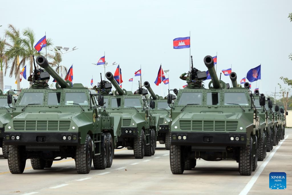 Military vehicles parade in celebration of the 25th anniversary of the founding of the Royal Cambodian Army (RCA) in Phnom Penh, Cambodia, Jan. 24, 2024. Cambodia on Wednesday celebrated the 25th anniversary of the founding of the RCA, an arm of the Royal Cambodian Armed Forces (RCAF).(Photo: Xinhua)