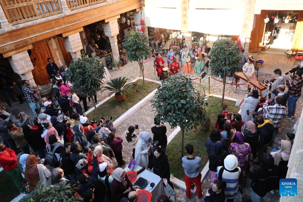 Moroccan people enjoy traditional Chinese folk music during a cultural event marking the coming Chinese Spring Festival in Rabat, Morocco on Jan. 24, 2024.(Photo: Xinhua)