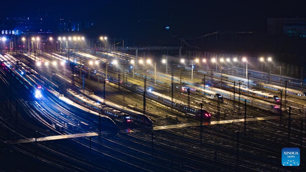 An aerial drone photo taken on Jan. 25, 2024 shows bullet trains at Guiyang North bullet train maintenance station in Guiyang, southwest China's Guizhou Province. The Spring Festival, China's biggest traditional festival, will fall on Feb. 10, while the Spring Festival travel rush, usually a period of high transportation demand as people return home for family reunions, will run from Jan. 26 to March 5.(Photo: Xinhua)